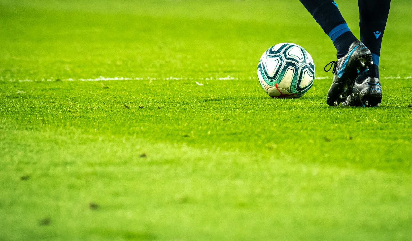 Football on a bright green turf